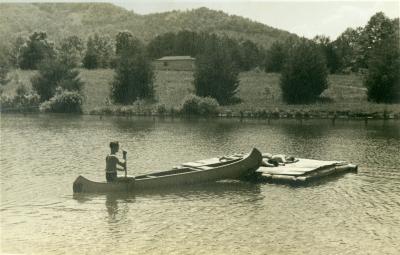 Student canoeing at Lake Eden