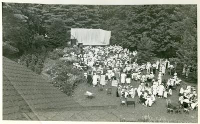 Post card of an outdoor stage performance