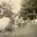 Untitled [Merce Cunningham and others having a picnic at Black Mountain College]