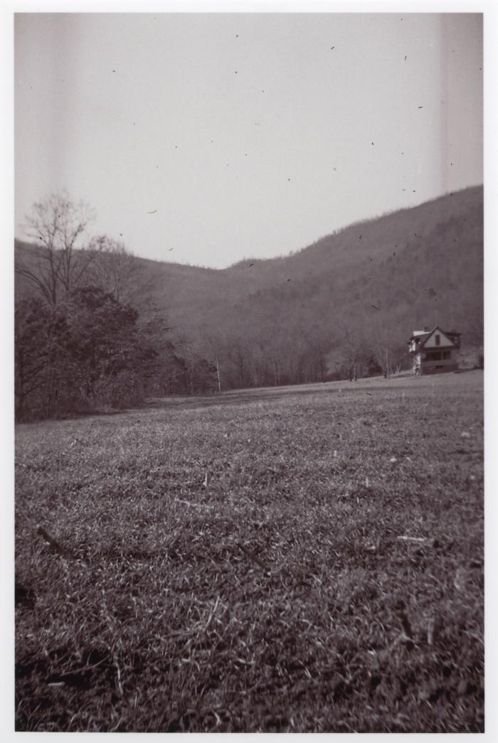 View of the farmhouse in the mountain landscape