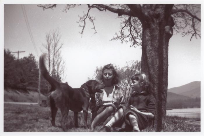 People with dog at Lake Eden