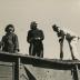 Vera Baker Williams, Nancy Miller Archer, and Gregory Masurovsky shoveling coal