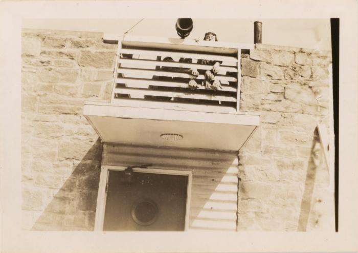 Erris Burnett and other students on upper porch of the Studies Building