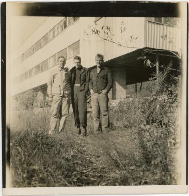 Ronald Jackson and two others next to the Studies Building