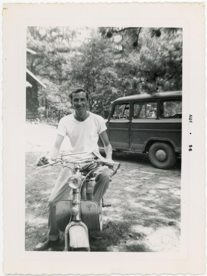 Michael Rumaker on a motorbike