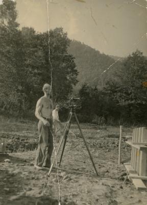 Ted Dreier surveying land at Lake Eden