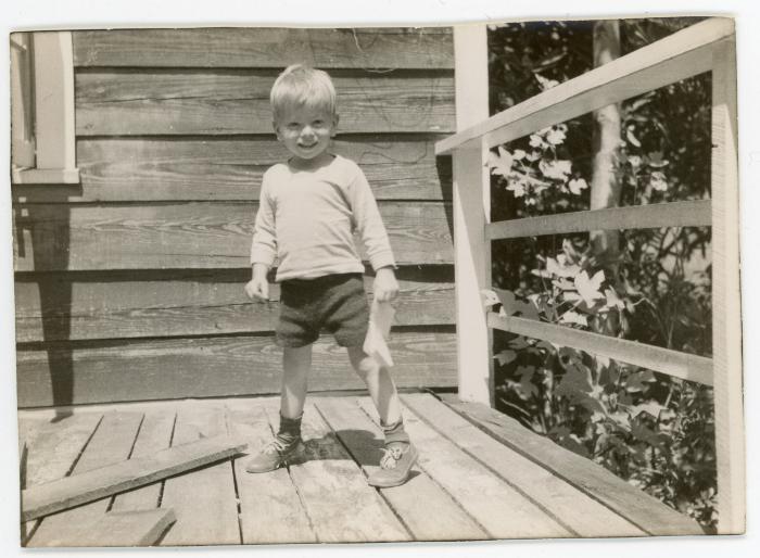 Child at the farmhouse at Lake Eden