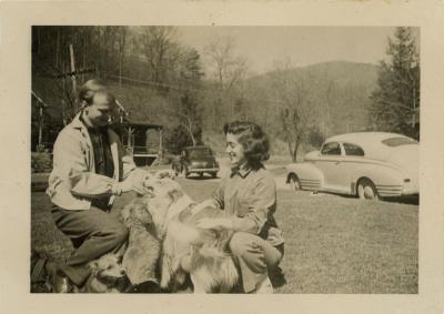 Students or faculty with dog at Lake Eden