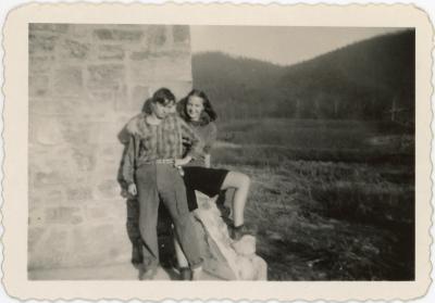 Jane Slater Marquis and John "Swack" Swackhamer next to the Studies Building