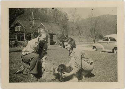 Students or faculty with dog at Lake Eden