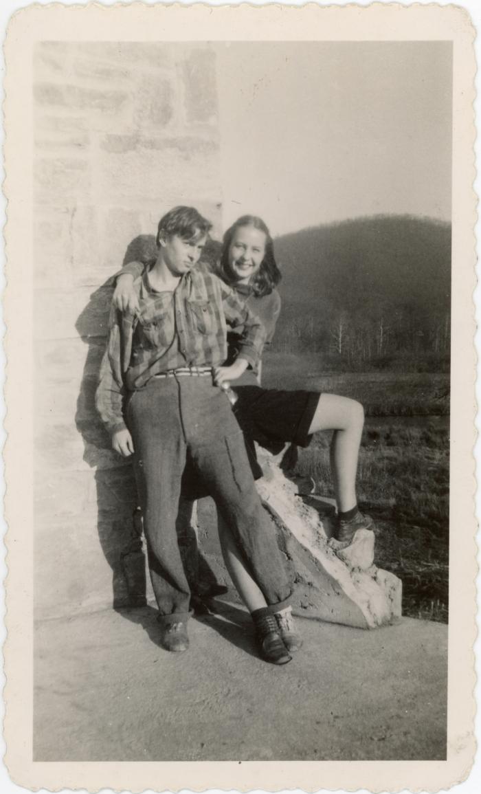 Jane Slater Marquis and John "Swack" Swackhamer next to the Studies Building