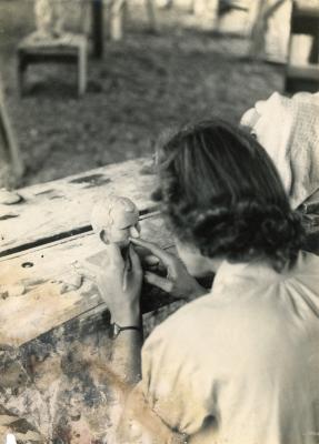 Student working on sculpture